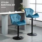 Blue velvet bar stool set of 2 with black round bases and footrests, angled view