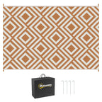 Brown and white geometric reversible outdoor rug with carry bag