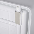 Grey cat litter box side door with perforated panel and latch detail