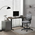 Grey rolling filing cabinet with three drawers near an office desk, visible cabinet front