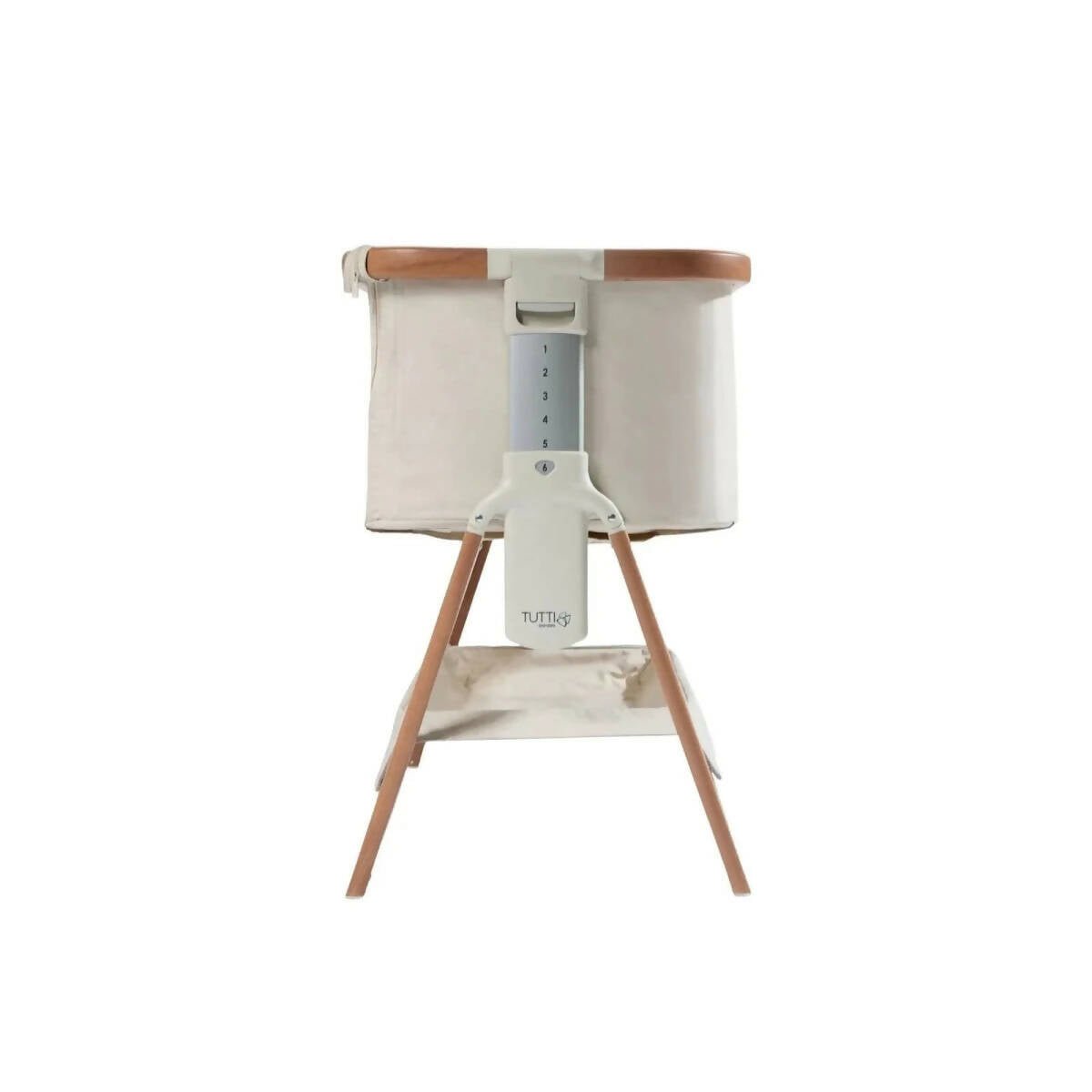 White support bracket under canopy on ecru bedside crib with walnut legs