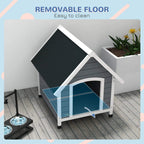 Grey wooden dog kennel with arched entrance; removable floor cutaway and black roof