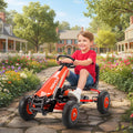 Red kids pedal go-kart with black seat and steering wheel, child riding outdoors.