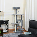 Dark grey cat tree with stacked steps, side tunnel opening, and hanging rope ball toy.
