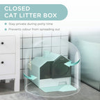 Light blue hooded cat litter tray with dark green entrance door and scoop holder