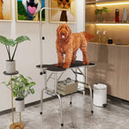 Foldable pet drying and grooming table with black tabletop, dog standing on platform