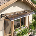 Installed front door rain shelter canopy with brown mesh roof and metal mounting brackets