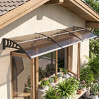 Installed front door rain shelter canopy with brown mesh roof and metal mounting brackets