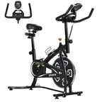 Black indoor stationary exercise bike with seat, handlebars, and LCD monitor