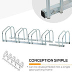 Silver bike parking rack base with feet and five U-shaped holders
