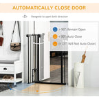 Black pet gate standing in doorway, with spring auto-close door design