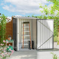 Grey lean-to steel garden shed with open door and slanted side wall
