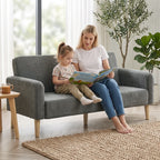 Grey velvet 2-seater sofa with wide seating and plush cushions for two