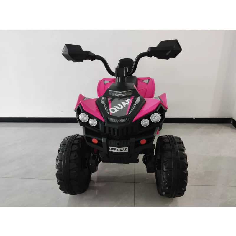 Pink electric kids quad bike front view with twin headlights and handlebars