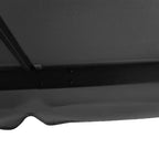 Dark grey double-tier roof panel seam detail with drainage grommet opening