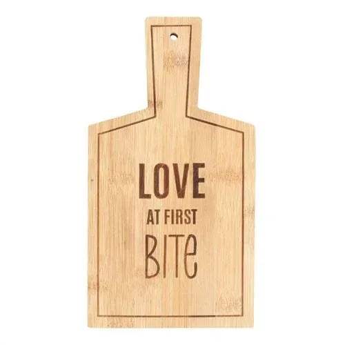 Bamboo serving board with LOVE AT FIRST BITE cutout text