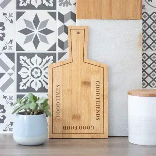 Bamboo serving board with handle hole and engraved “GOOD FRIENDS” and “GOOD FOOD”