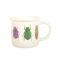 Off-white beetle mug with three colorful beetle illustrations on front