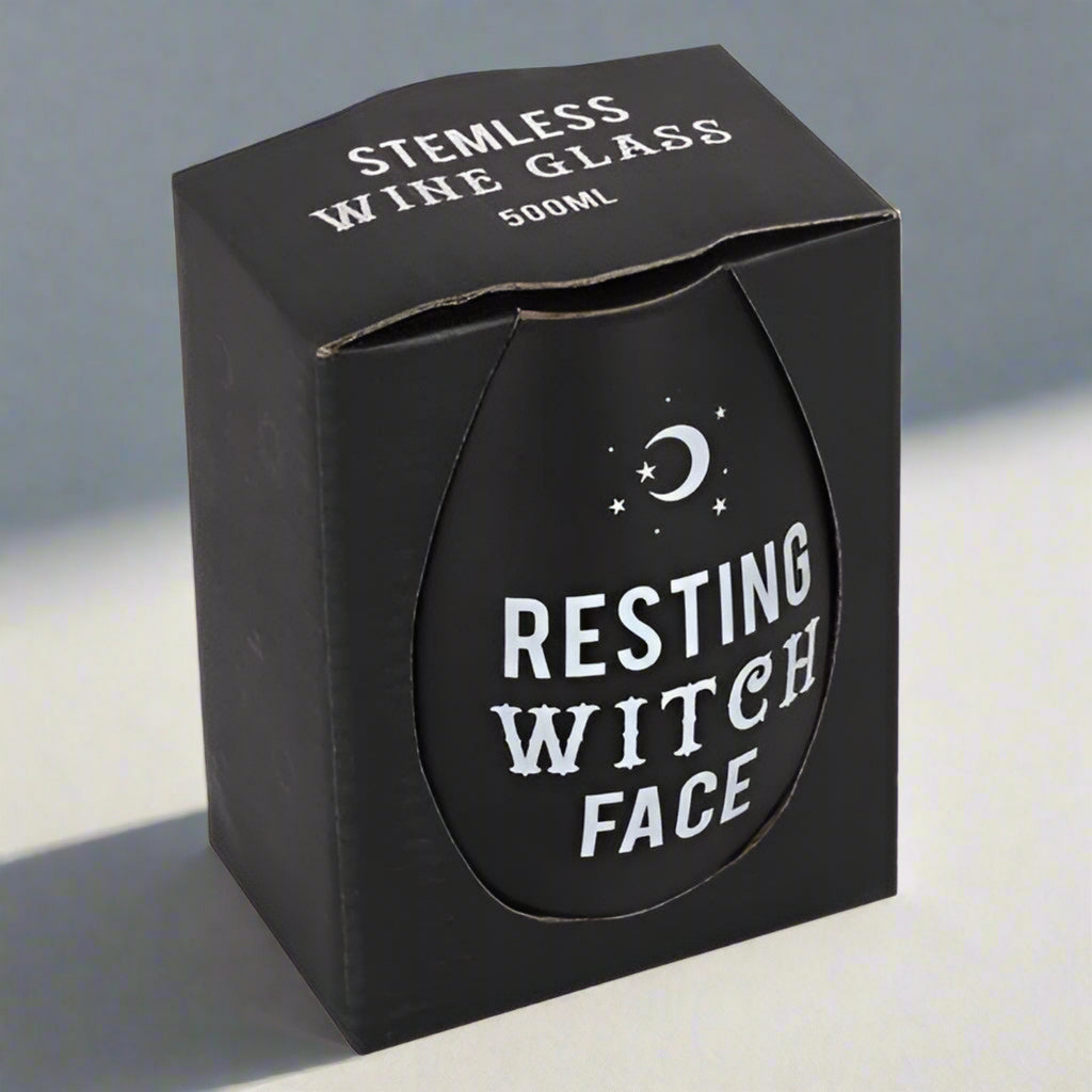 Black stemless wine glass packaging with 'Resting Witch Face' text and moon design.