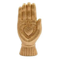 Gold sacred heart hand ornament with carved heart and ridged base cuff