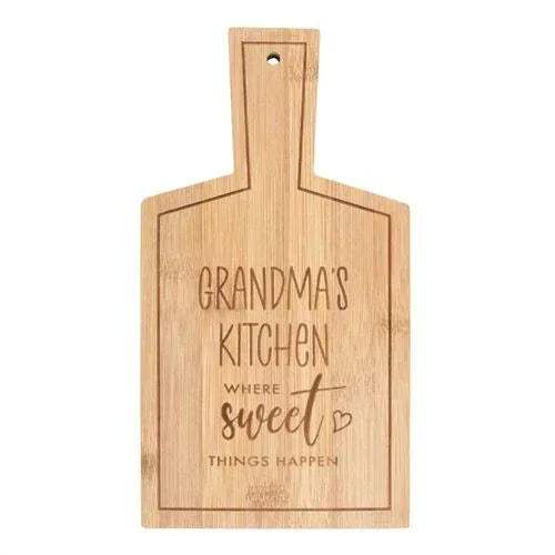 Bamboo serving board with handle and engraved “Grandma’s Kitchen Sweet” message.