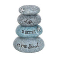 Blue-gray resin stone stack ornament with star and 'Life is Better at the Beach' text