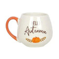White rounded ceramic mug with orange handle and “Hello Autumn” pumpkin design