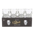 Set of 4 clear skull shot glasses with raised skull faces, boxed together