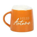 Orange ceramic mug with white “HELLO Autumn” print and side handle