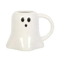 White ghost-shaped mug with black eyes and small mouth