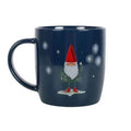 Dark blue ceramic mug with gnome illustration and star pattern, side view