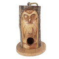 Wood owl birdhouse with carved closed eyes and round entrance hole
