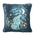 Square midnight hare cushion in dark blue velvet with illustrated hare, moon, and stars