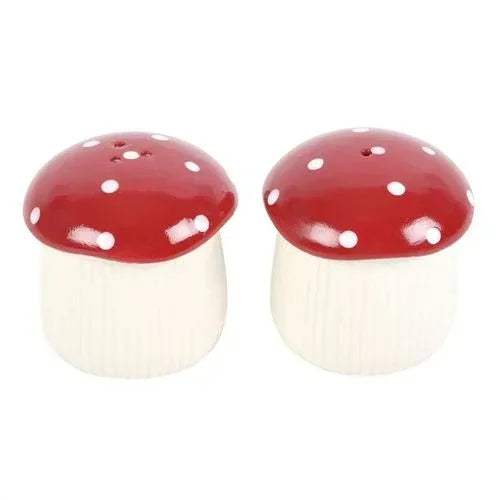 Mushroom salt and pepper shaker set with red dotted caps and white ribbed bases
