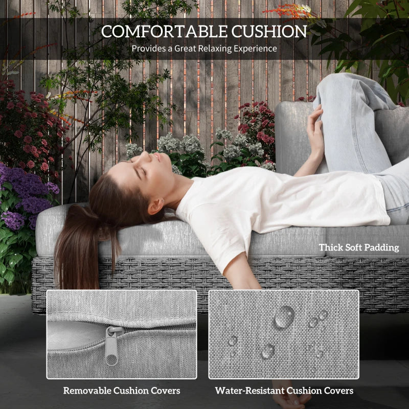 Light grey sofa cushions on woven rattan frame with thick padding
