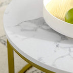 Close-up of white marble-look tabletop with gold metal frame edge