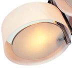 Close-up of white acrylic lamp shade underside with chrome mounting ring
