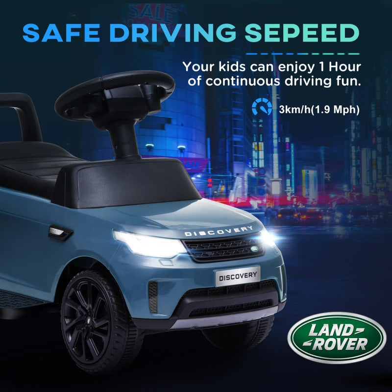 Light blue kids electric ride-on car with front headlights, black wheels, and raised seat