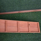 Wooden hutch base panel with wire mesh wall section and metal latch