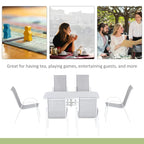 Outdoor dining set with white table and grey mesh armchairs for six