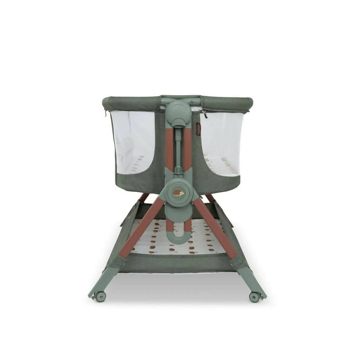 Olive folding bedside crib standing with canopy sides and patterned mattress tray