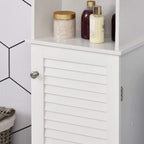 White shutter-door cabinet with round metal knob and painted slat panels