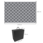Gray and white trellis outdoor rug with white border, sized 182 x 274 cm