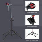 Black folding bicycle repair stand with quick-release clamp and detachable tool tray