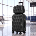 Black 2-piece hard-shell luggage set with one suitcase open, showing folded clothes inside.