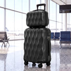 Black 2-piece hard-shell luggage set with one suitcase open, showing folded clothes inside.