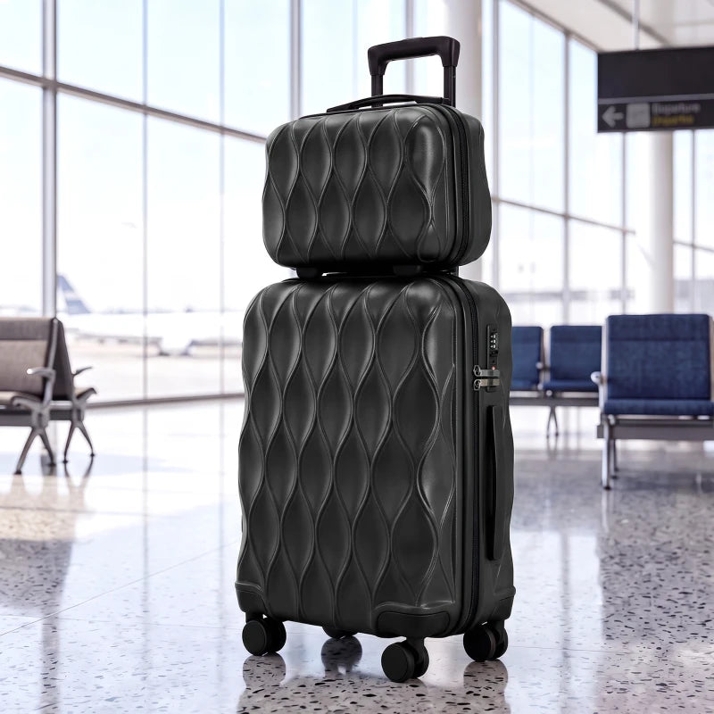 Black 2-piece hard-shell luggage set with one suitcase open, showing folded clothes inside.