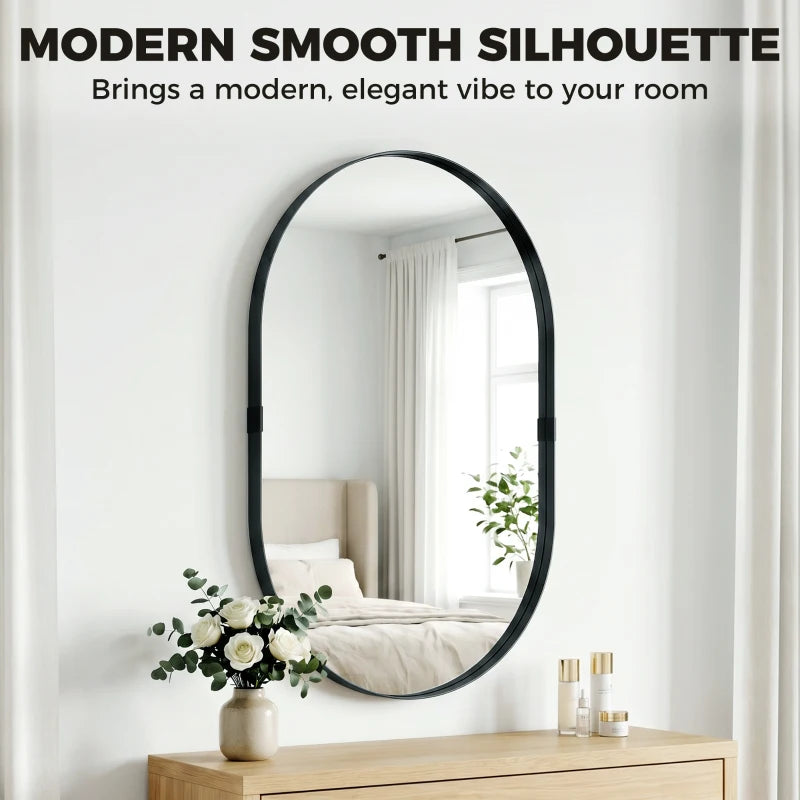 Black oval wall mirror with smooth rounded frame and reflective surface