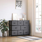 Dark grey fabric chest of drawers with 8 foldable drawers and black handles