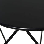 Black round tabletop close-up with steel cross-brace support below